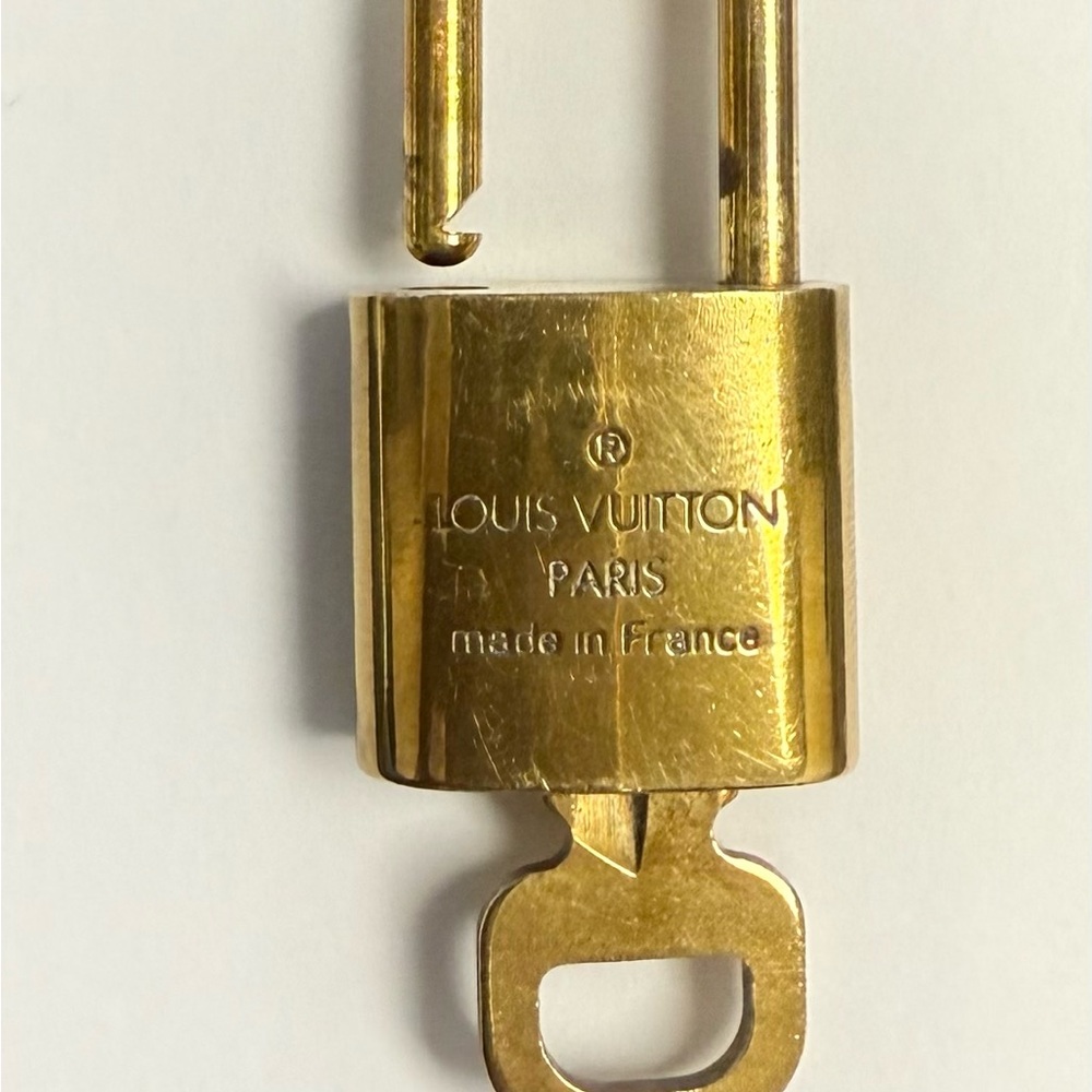 Louis Vuitton Luxurious Bronze Lock